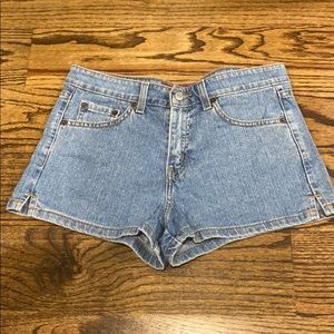 Levi’s blue jean shorts.